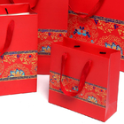 Los bolsos de papel revestidos laminados del regalo con el ODM del OEM de las manijas apoyaron