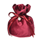 El regalo inodoro colorido del lazo de la tela empaqueta el pequeño material del terciopelo