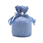 El regalo azul redondo del lazo de la tela del ante empaqueta para el empaquetado de la joyería